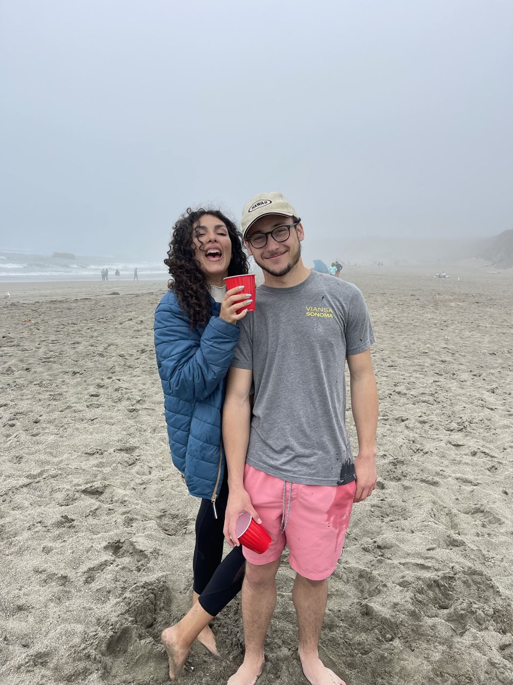 Ileana and Tristan on a foggy beach