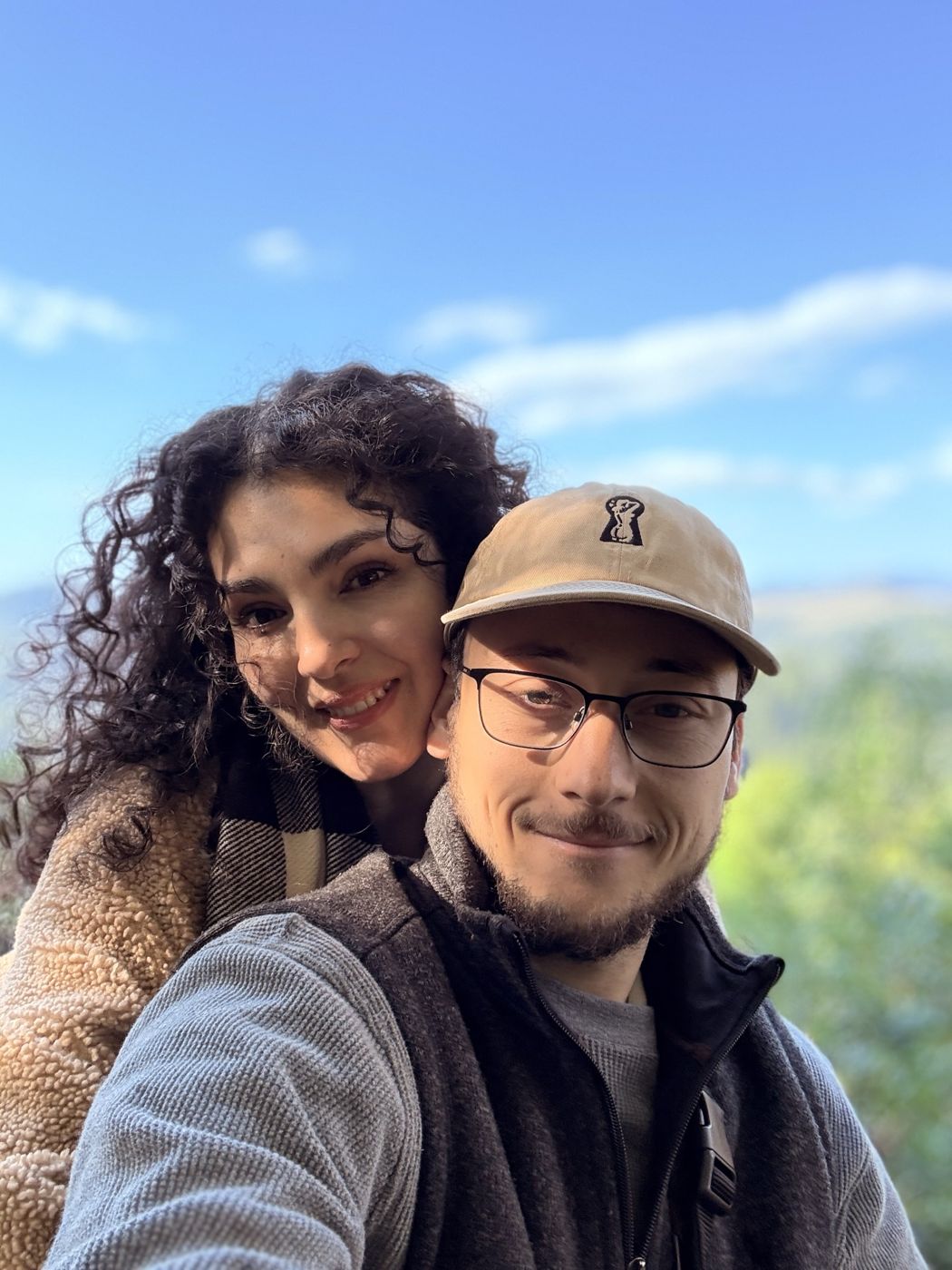 Tristan and Ileana under a blue sky